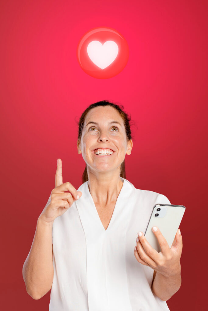 Happy woman using a dating app